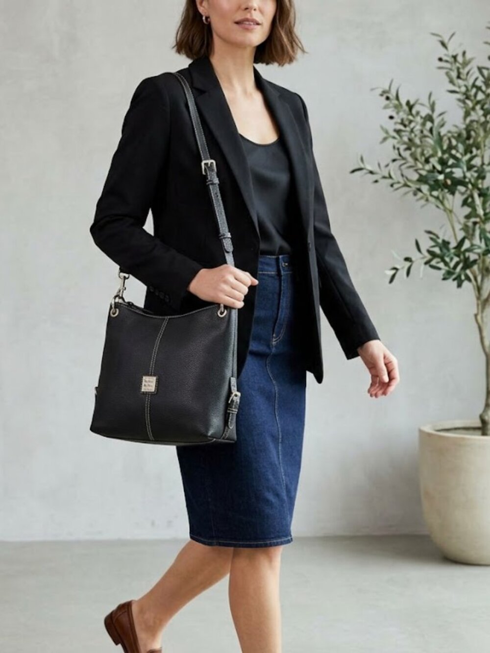 Dooney and Bourke black purse with red interior